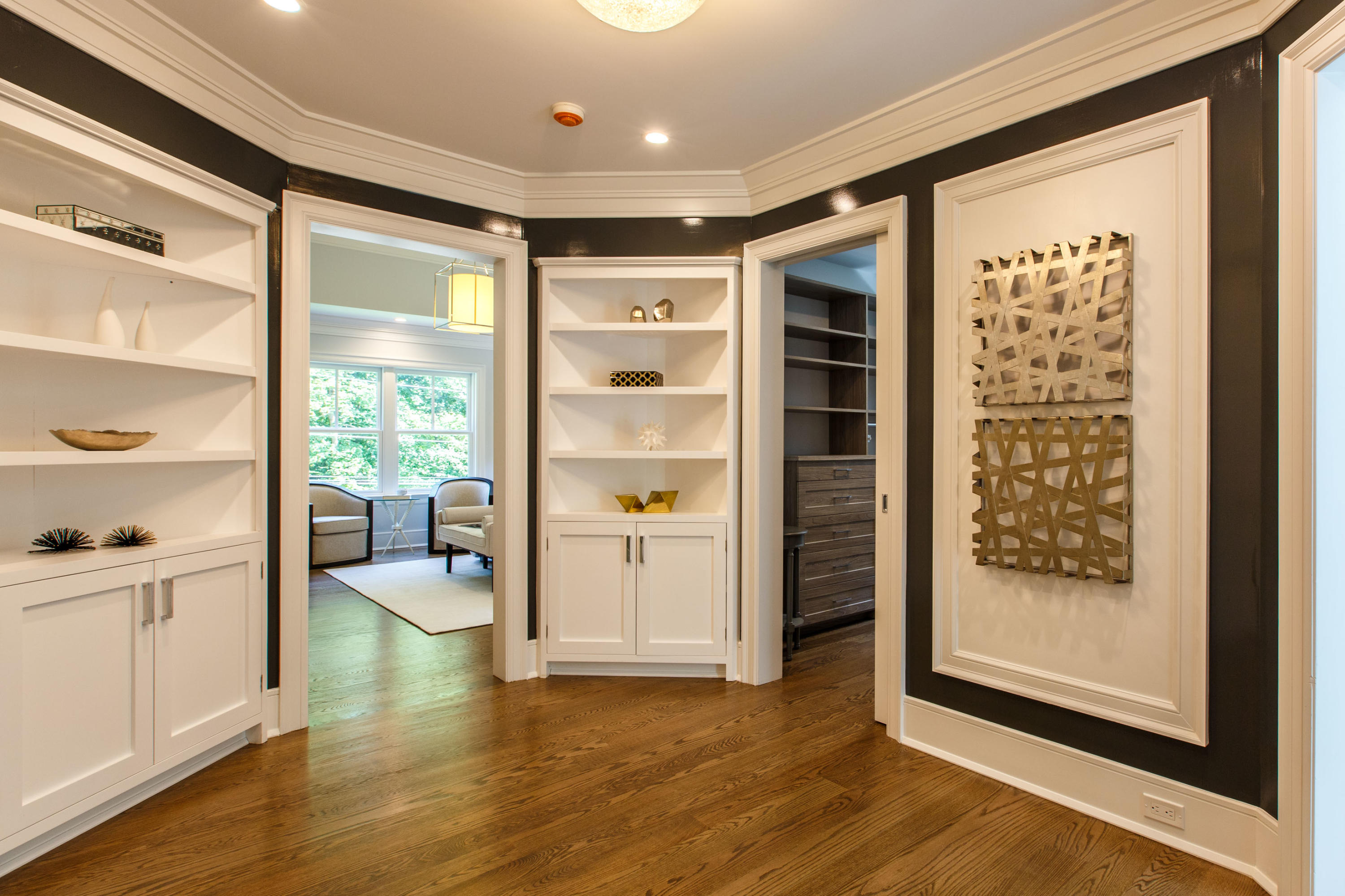 72 Deepwood Road Darien, CT 06820 - Photo 25 of 39 a view of a hallway to room with wooden floor and windows