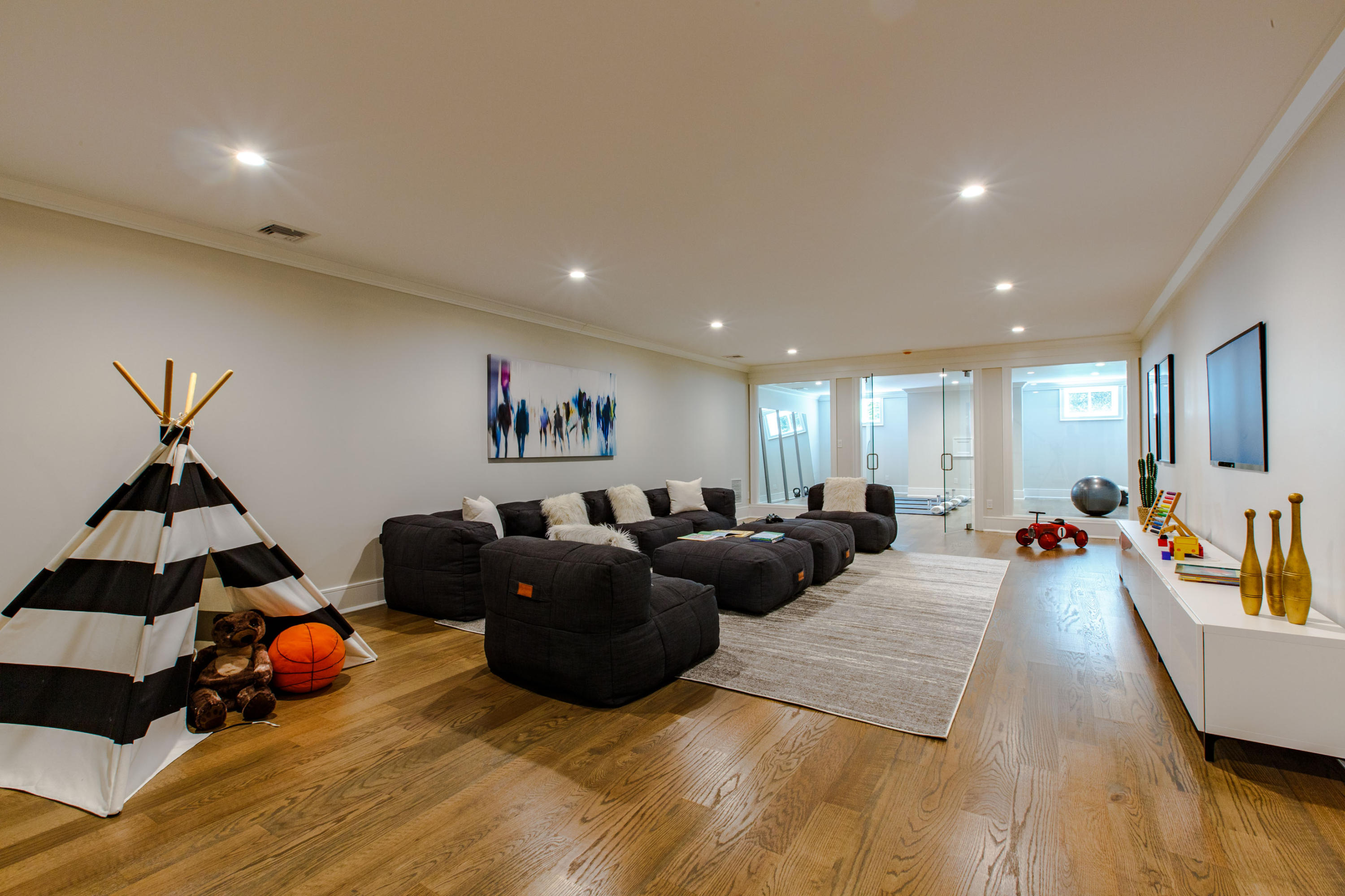 72 Deepwood Road Darien, CT 06820 - Photo 34 of 39 a living room with furniture and wooden floor