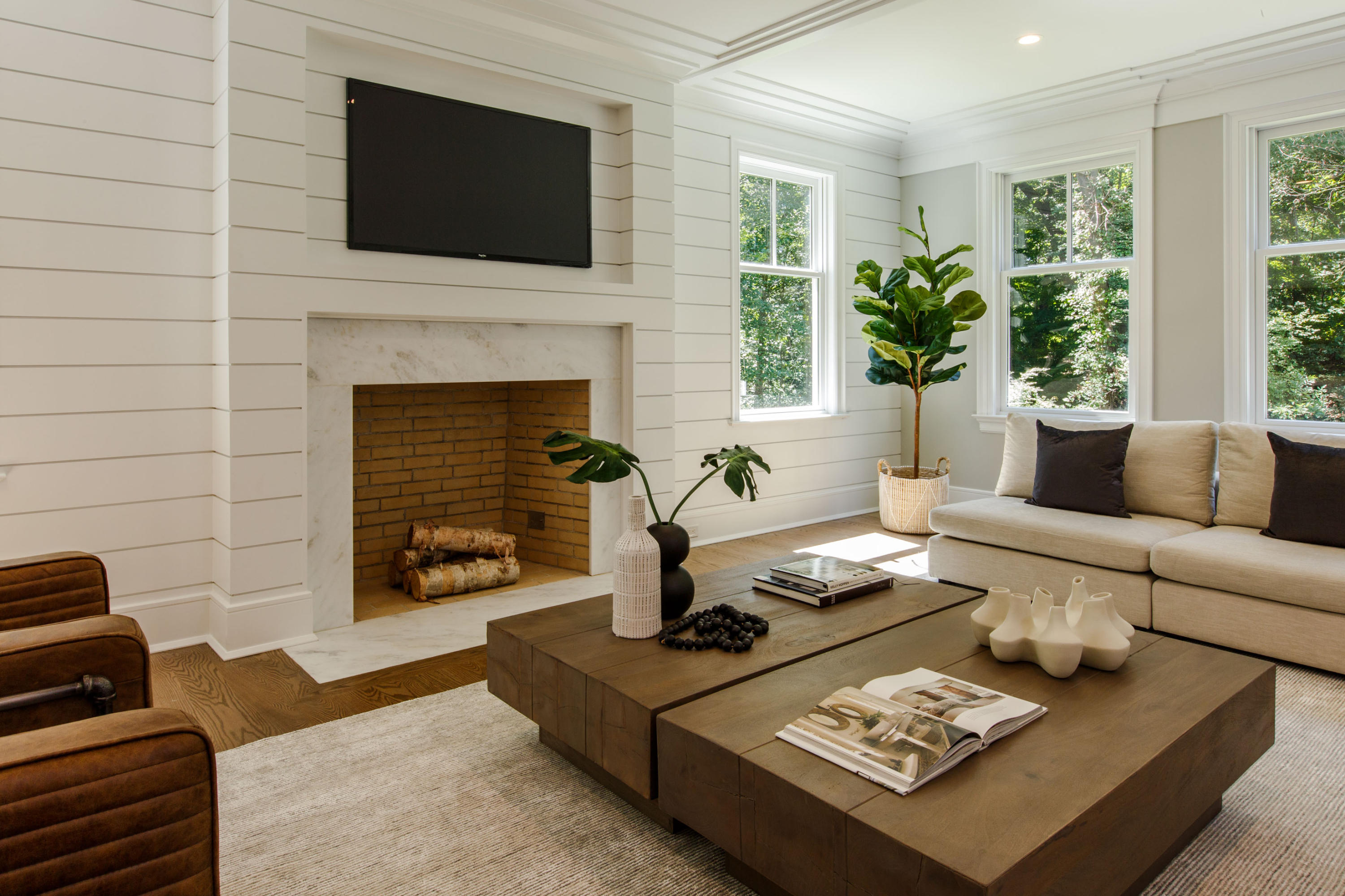 72 Deepwood Road Darien, CT 06820 - Photo 10 of 39 a living room with furniture and a fireplace