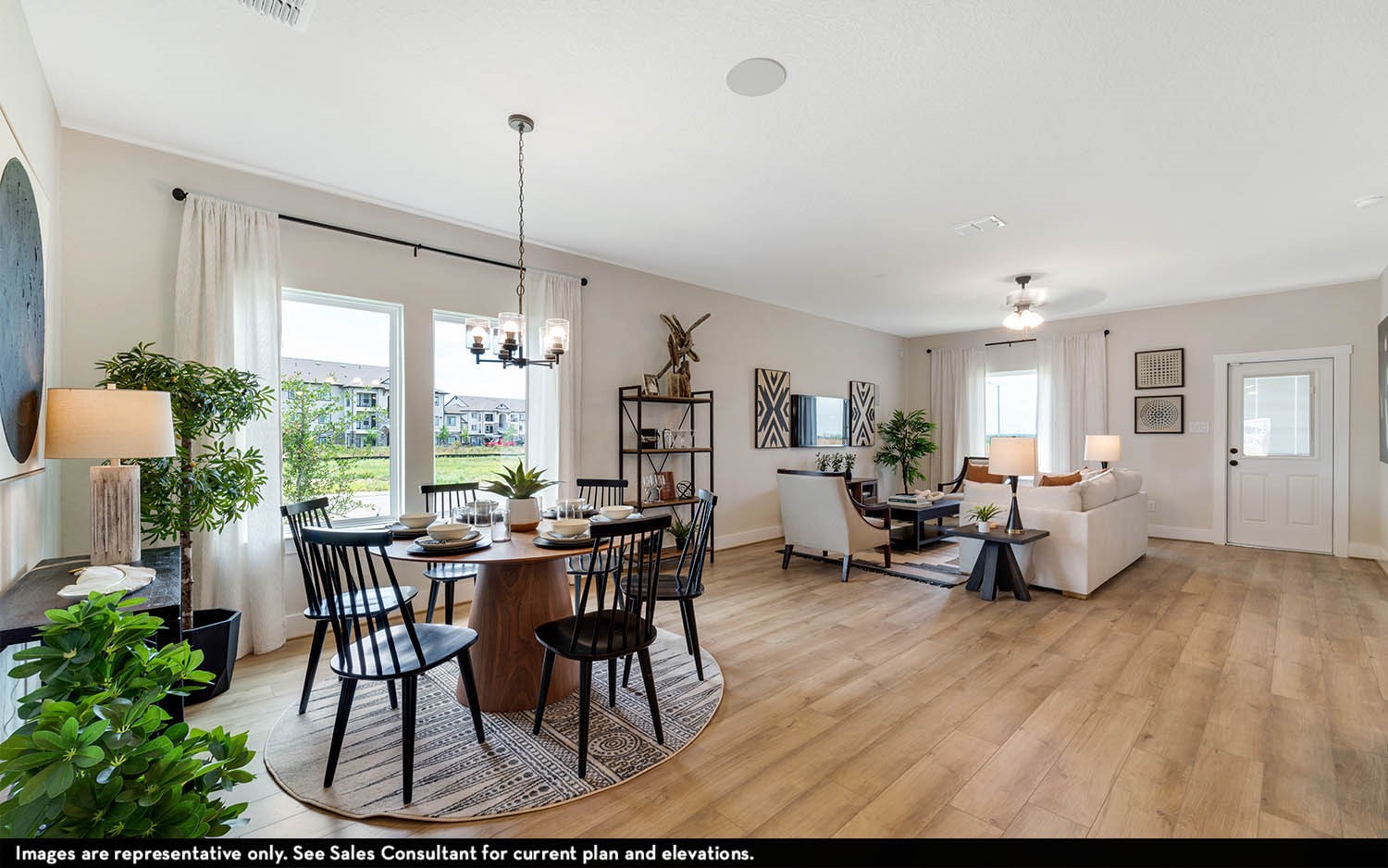 9006 Gull Cyn Drive Baytown, TX 77521 - Photo 8 of 25 a view of a dining room with furniture window and wooden floor