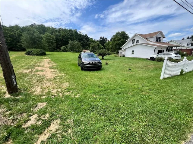 a house view with a garden space