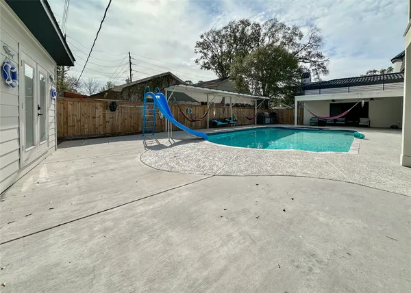 a house with trees in front of it