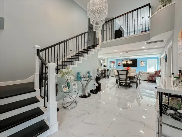 a view of entryway livingroom and hall
