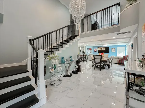 a view of entryway livingroom and hall