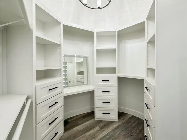 a view of an empty walk in closet