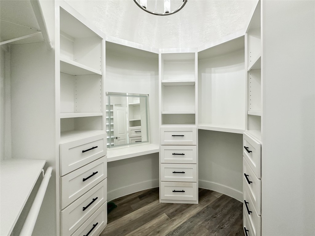 19310 Enchanted Oaks Drive Spring, TX 77388 - Photo 24 of 49 a view of walk in closet and cabinet