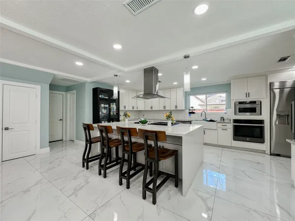 a view of a dining room with furniture