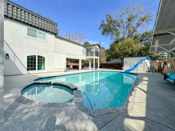 a view of a house with a swimming pool