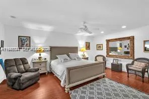 a bedroom with furniture and a couch