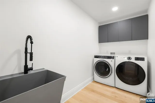 a living room with a couch and a floor to ceiling window