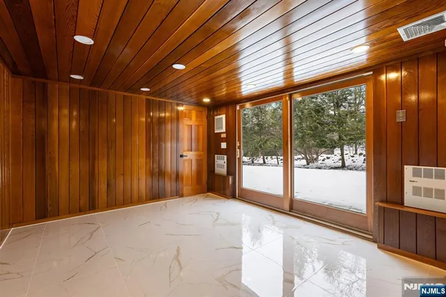 a view of backyard with a deck