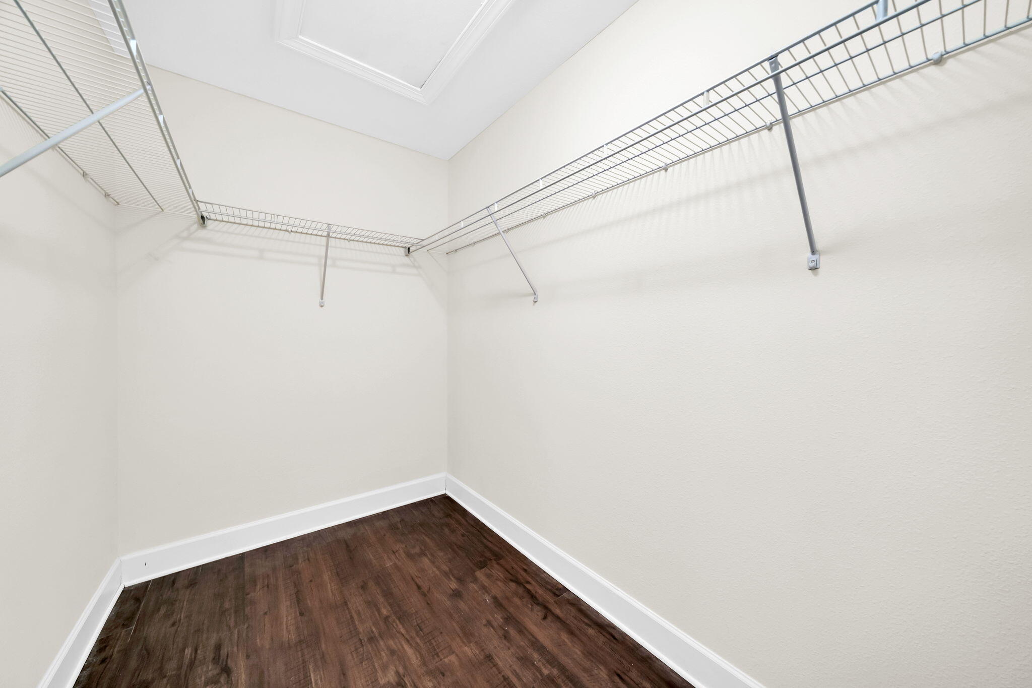 159 Golden Eagle Court, Unit 3C Santa Rosa Beach, FL 32459 - Photo 27 of 34 a view of a room with racks on the wall