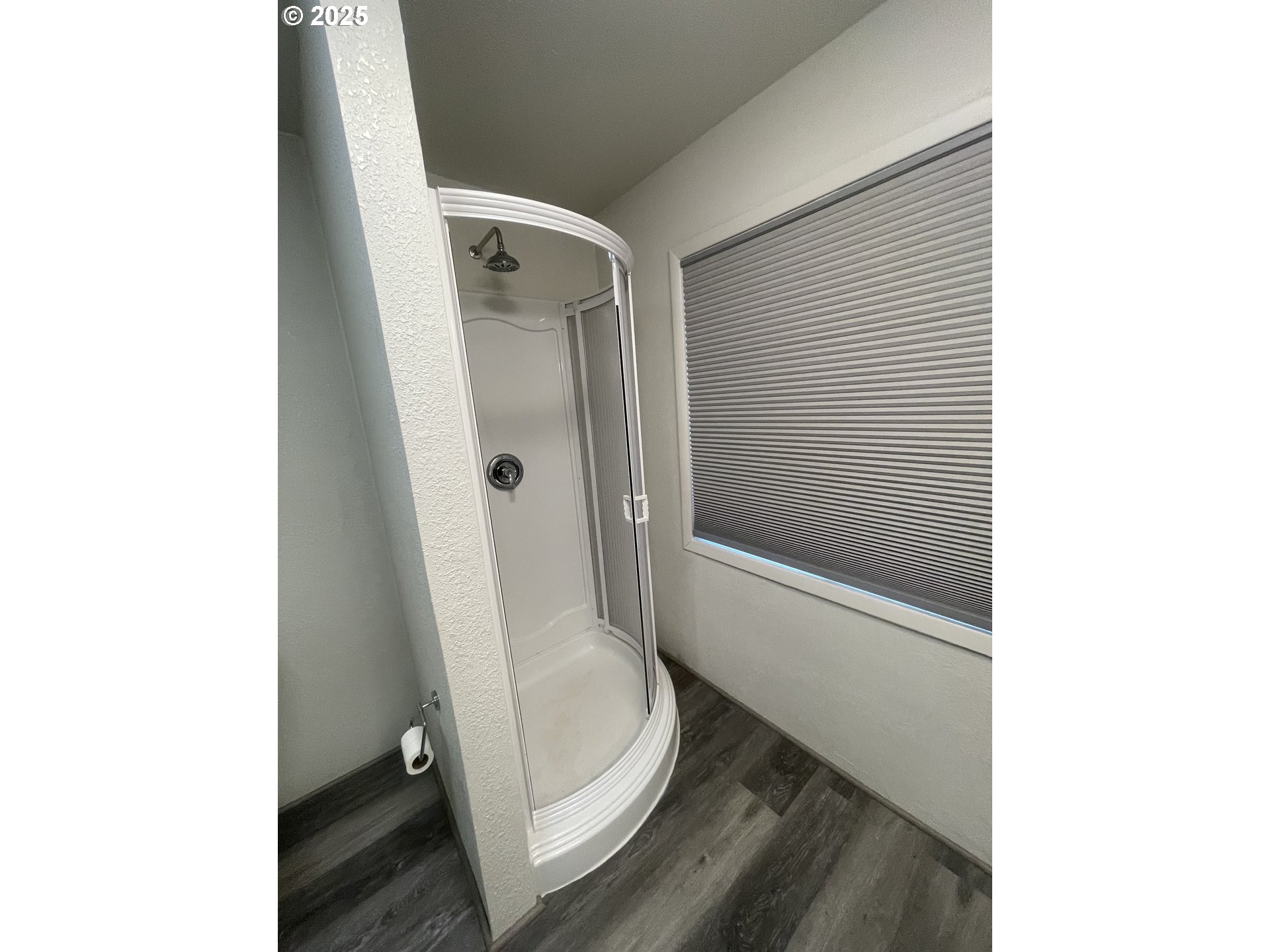 62886 Highway 74 Ione, OR 97843 - Photo 12 of 15 a bathroom with a toilet and a shower