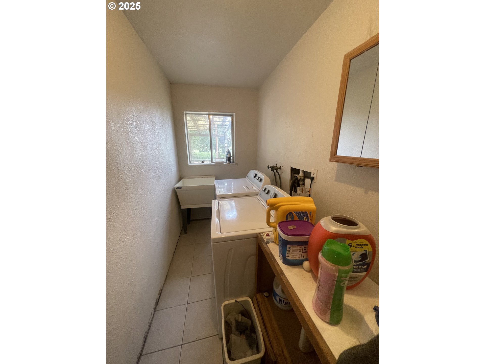 62886 Highway 74 Ione, OR 97843 - Photo 13 of 15 a utility room with dryer and washer