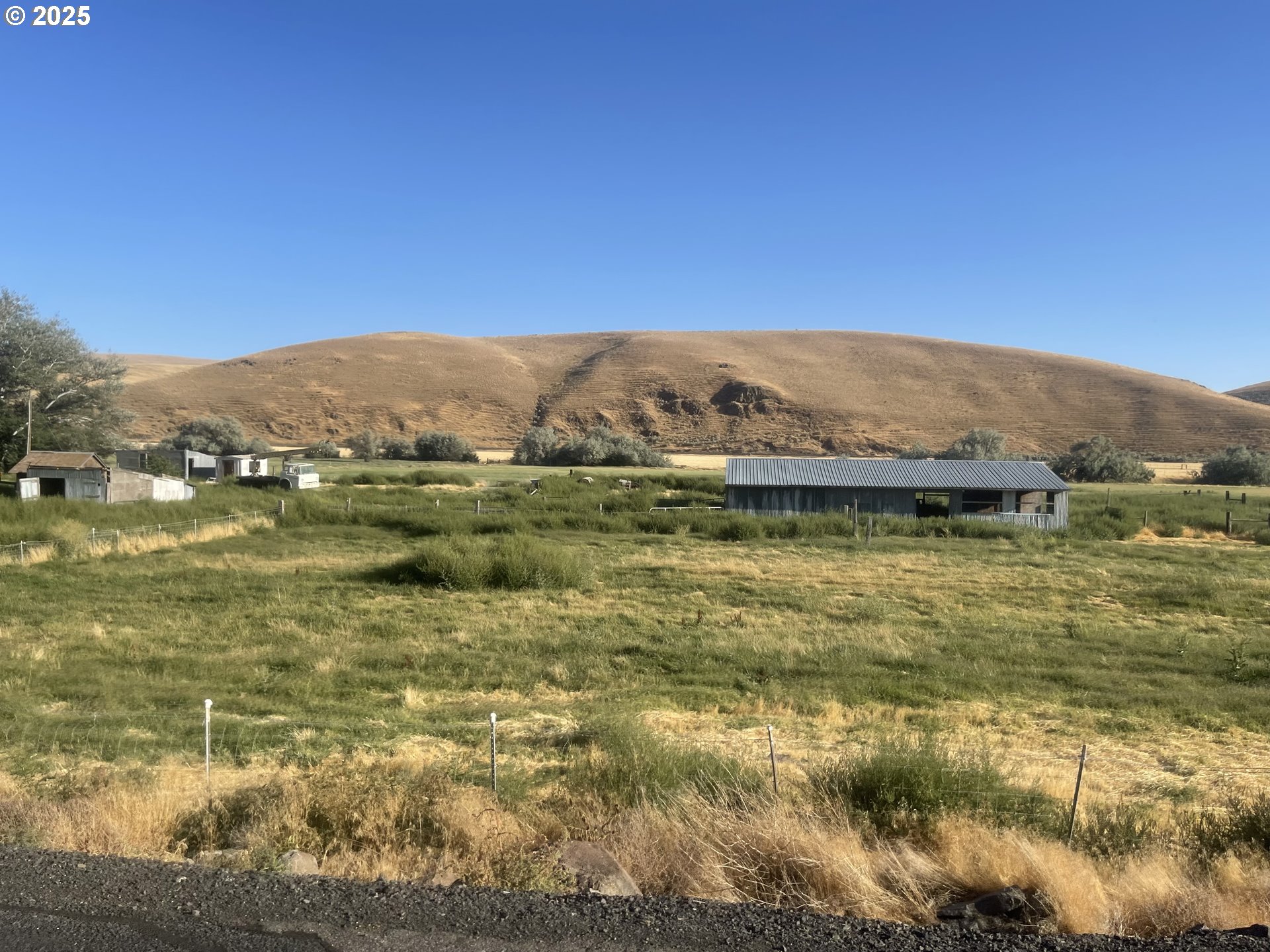 62886 Highway 74 Ione, OR 97843 - Photo 2 of 15 a view of lake with mountain
