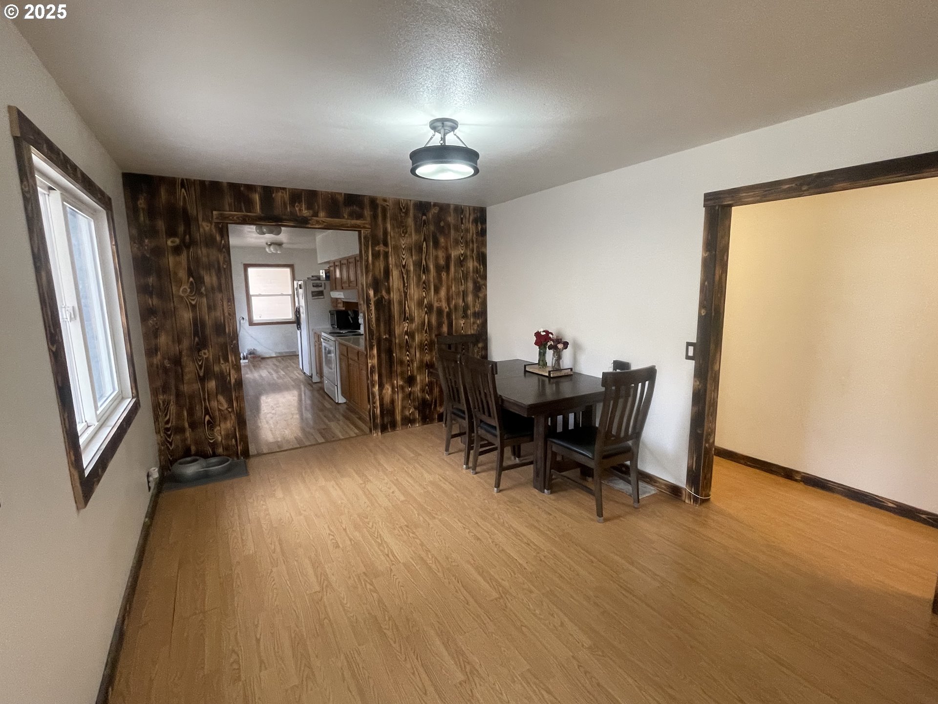 62886 Highway 74 Ione, OR 97843 - Photo 5 of 15 a view of a livingroom with furniture and a window