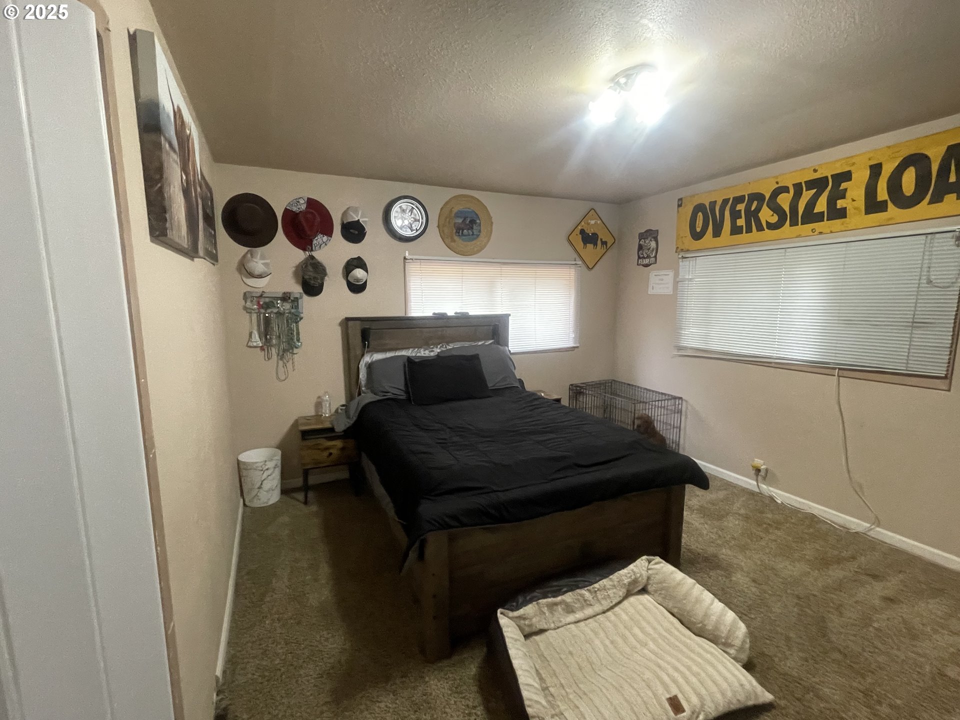 62886 Highway 74 Ione, OR 97843 - Photo 8 of 15 a bedroom with a bed and cabinets