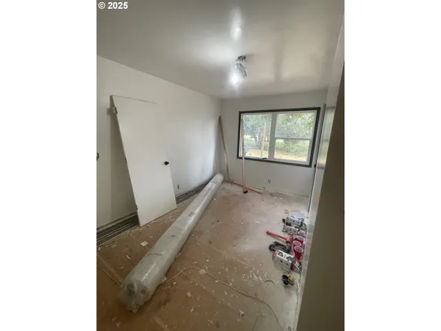a view of a livingroom with a fireplace