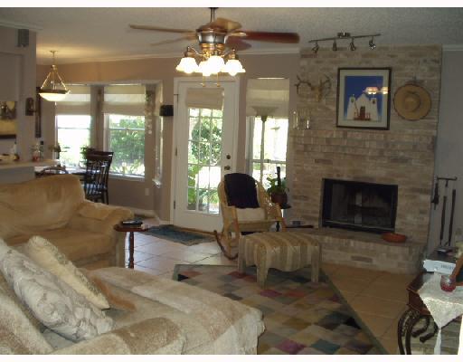 15258 Capstan Street Corpus Christi, TX 78418 - Photo 2 of 7 a living room with furniture and a fireplace