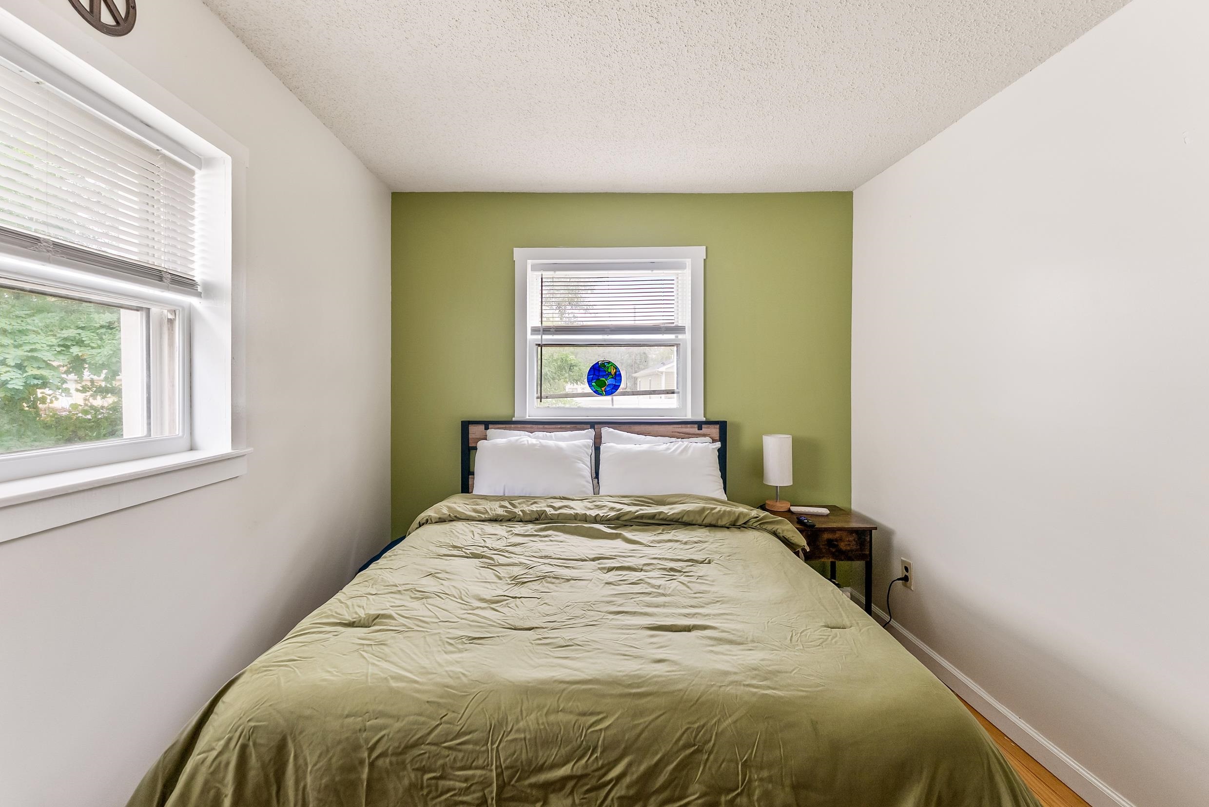 213 Langs Avenue Villas, NJ 08251 - Photo 12 of 20 a bedroom with a bed and a window