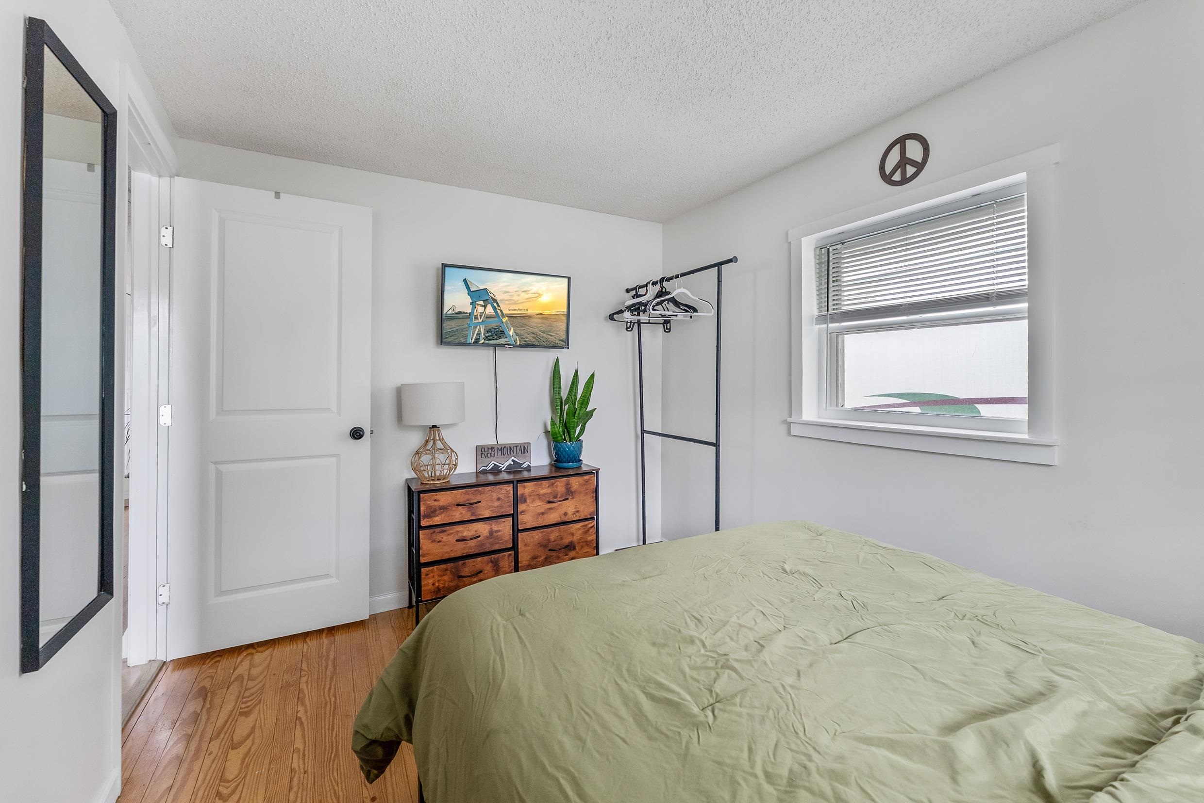 213 Langs Avenue Villas, NJ 08251 - Photo 13 of 20 a bedroom with a bed and wooden floor