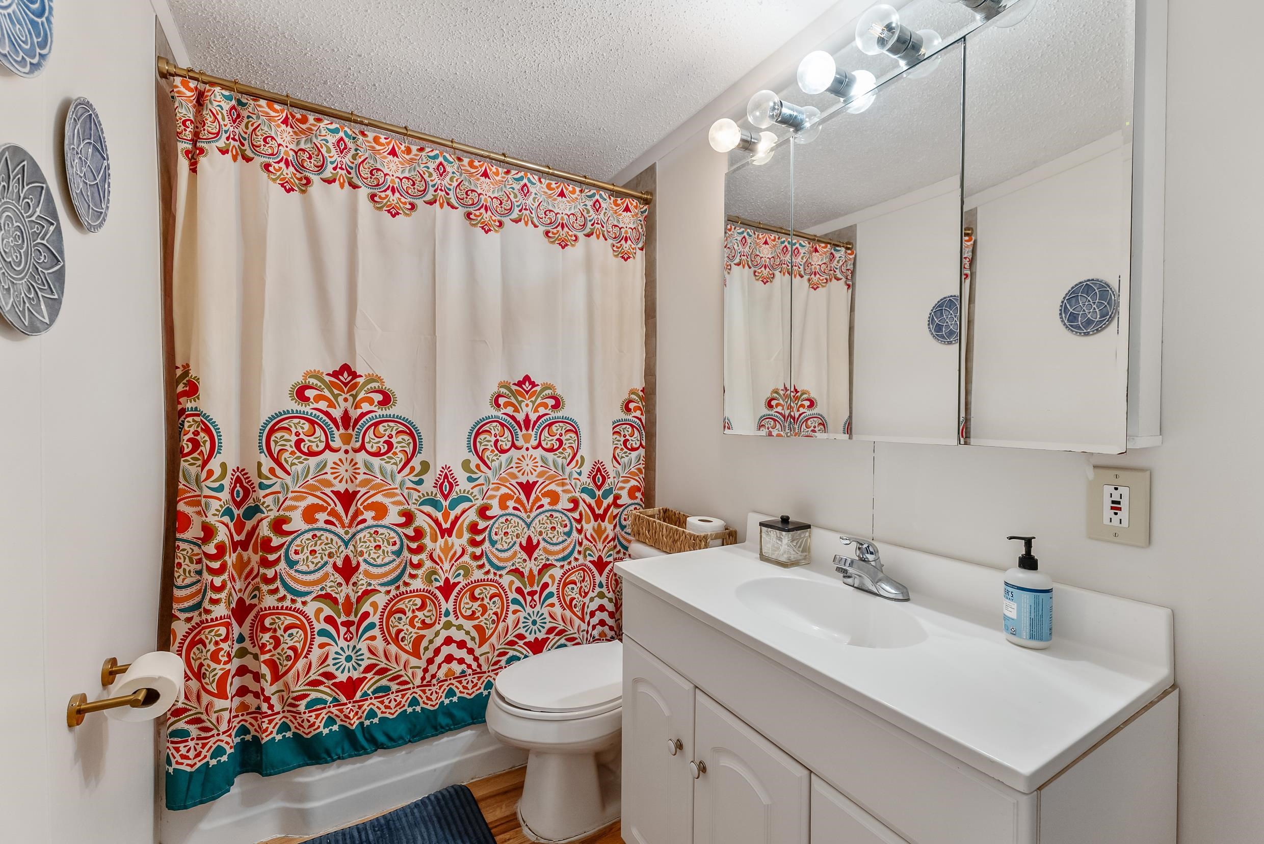 213 Langs Avenue Villas, NJ 08251 - Photo 9 of 20 a bathroom with a sink toilet and shower