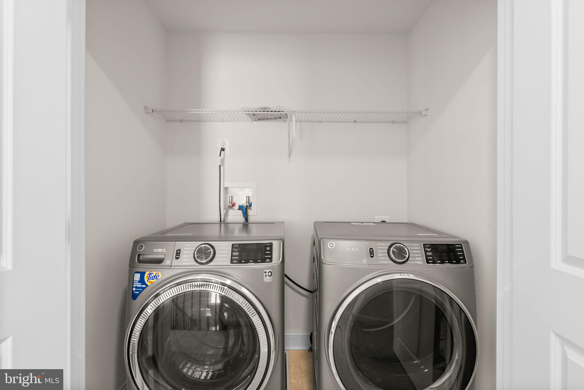 2 Hanover Road Reisterstown, MD 21136 - Photo 19 of 30 a view of storage and utility room with washer and dryer