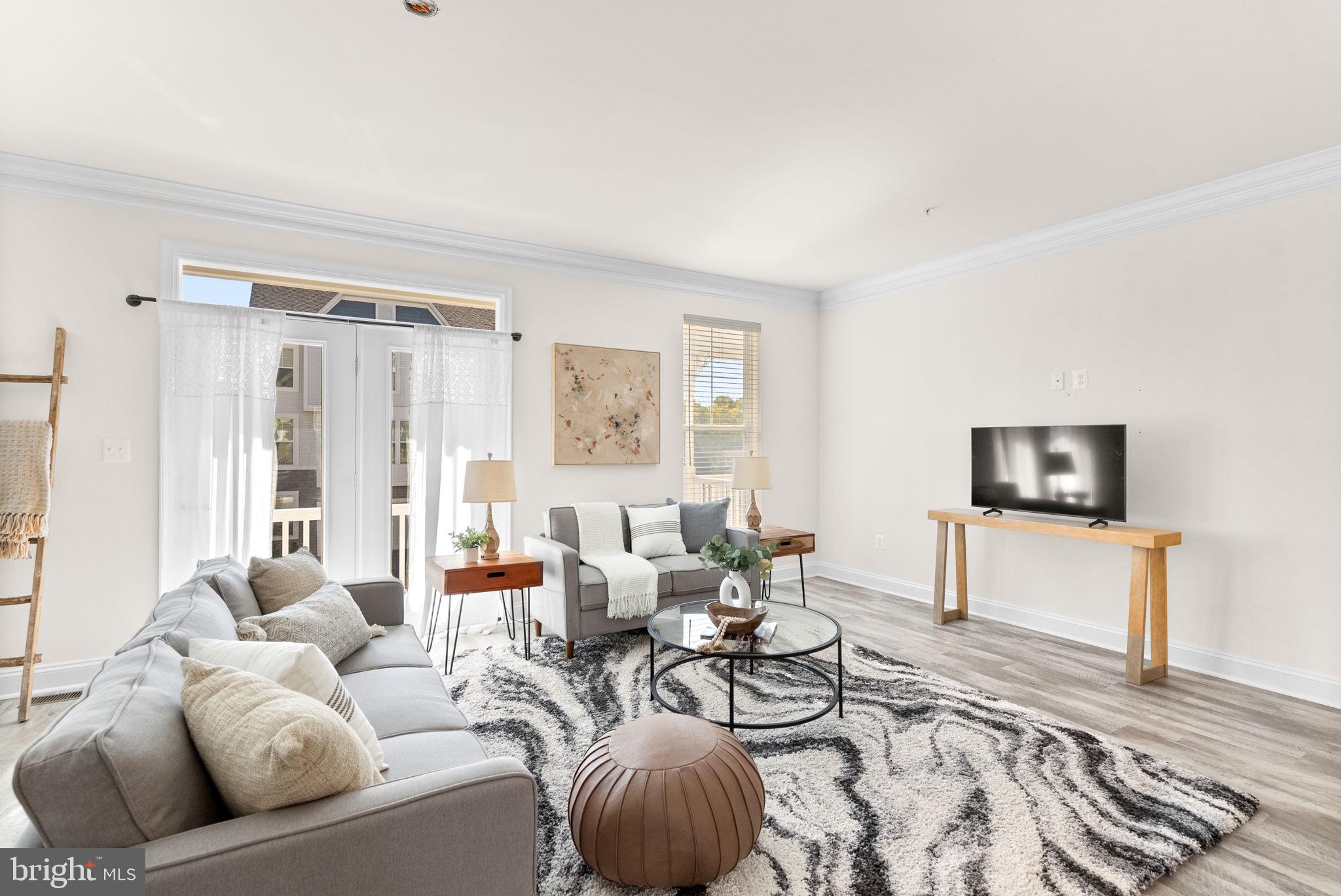 2 Hanover Road Reisterstown, MD 21136 - Photo 4 of 30 a living room with furniture and a flat screen tv