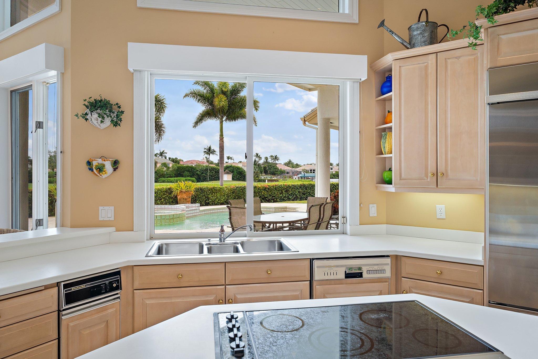3388 Barrow Island Road Jupiter, FL 33477 - Photo 21 of 59 Kitchen window w/beautiful views
