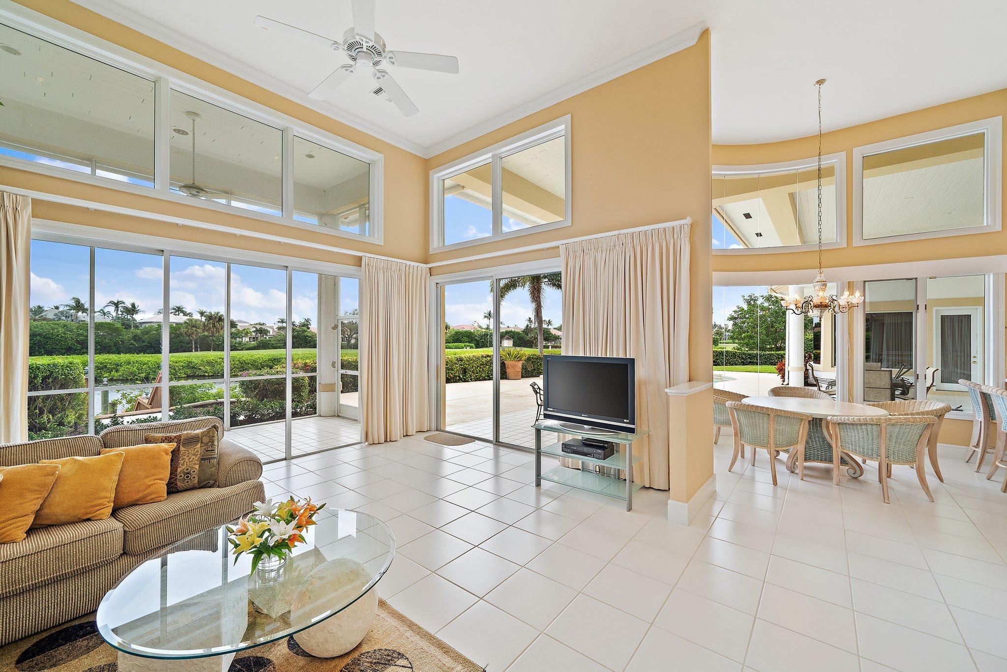 3388 Barrow Island Road Jupiter, FL 33477 - Photo 25 of 59 Family room looking to water and course