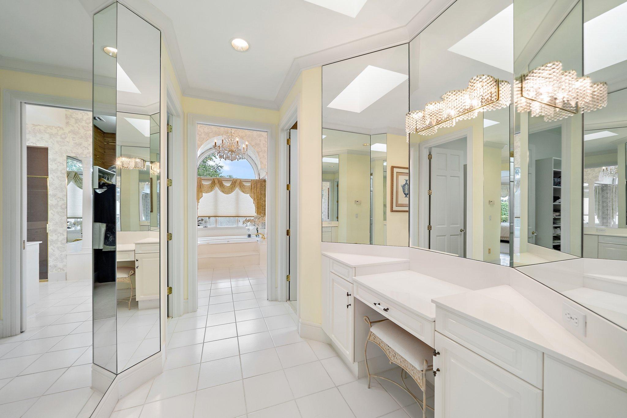 3388 Barrow Island Road Jupiter, FL 33477 - Photo 39 of 59 Hall to her bath w/ dressing area