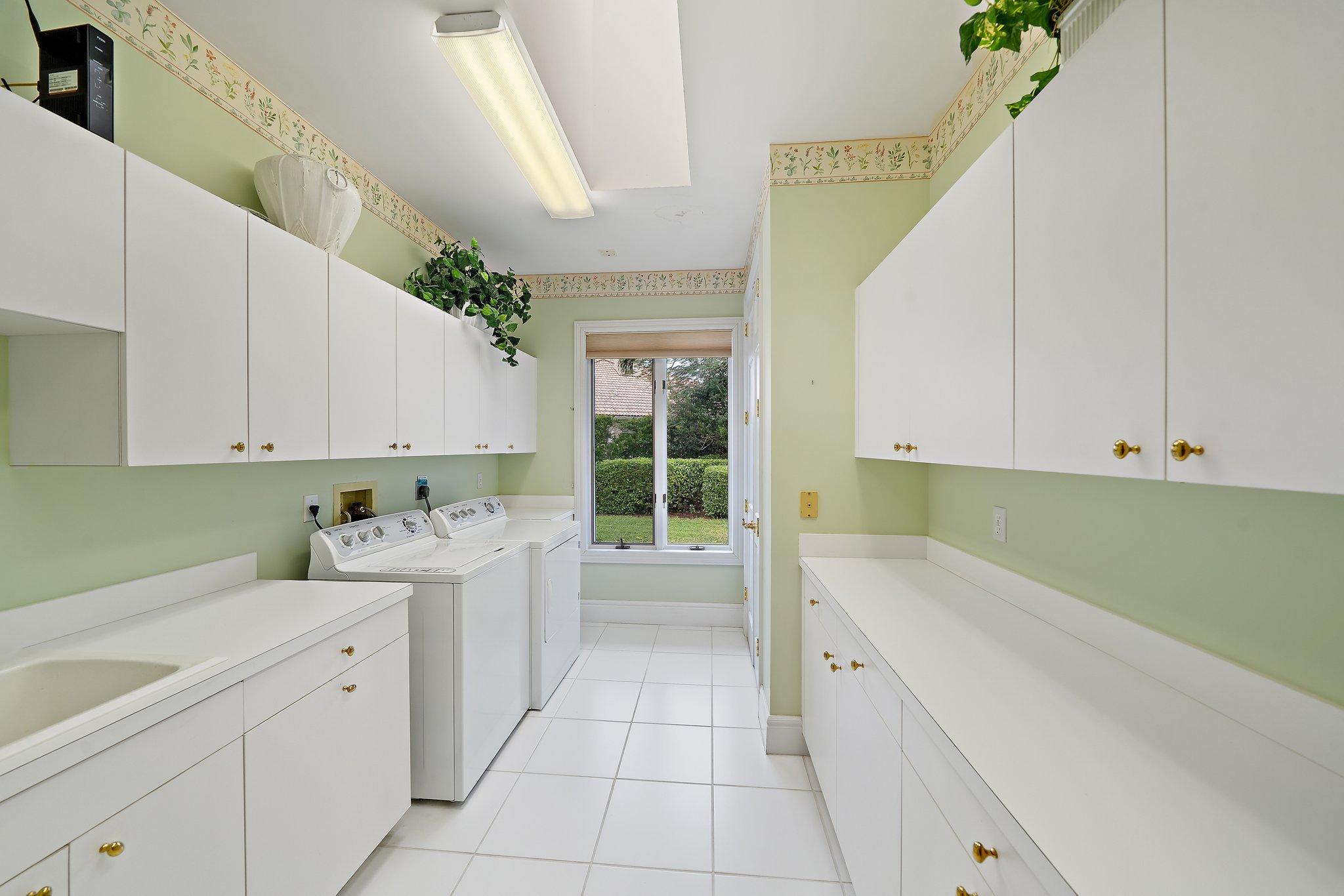 3388 Barrow Island Road Jupiter, FL 33477 - Photo 51 of 59 Large laundry room