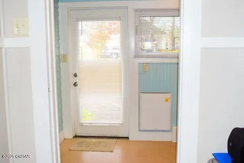 a kitchen with stainless steel appliances granite countertop a stove and a microwave
