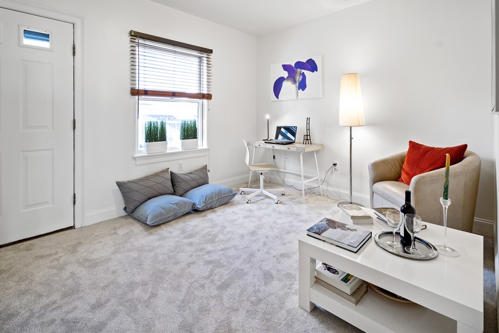 877 Harrison Avenue, Unit 7 Boston, MA 02118 - Photo 18 of 25 a bedroom with furniture and a window