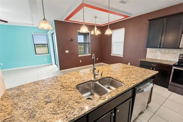 a view of room with window and wooden floor