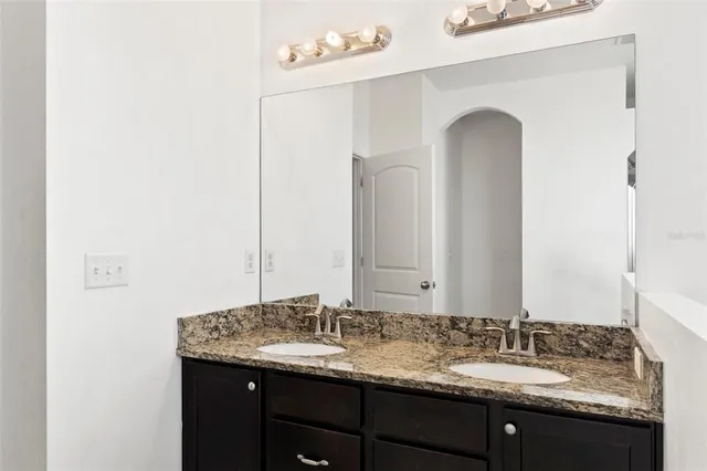 an aerial view of residential building and ocean