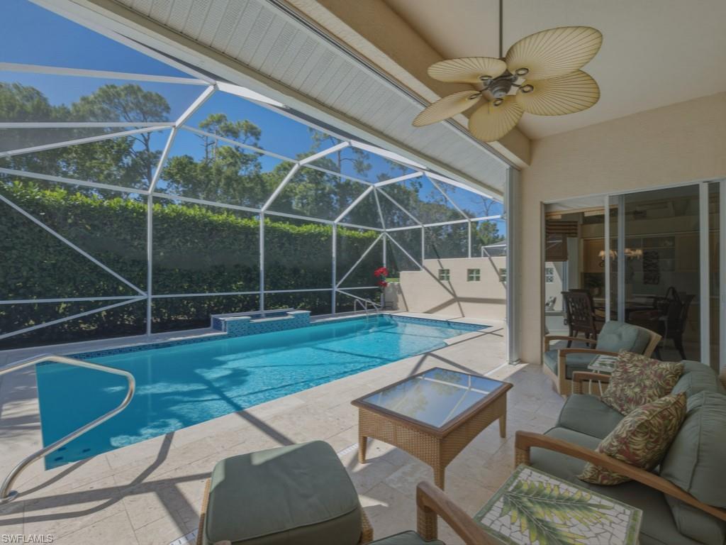 5835 Persimmon Way Naples, FL 34110 - Photo 19 of 50 a house view with a backyard space