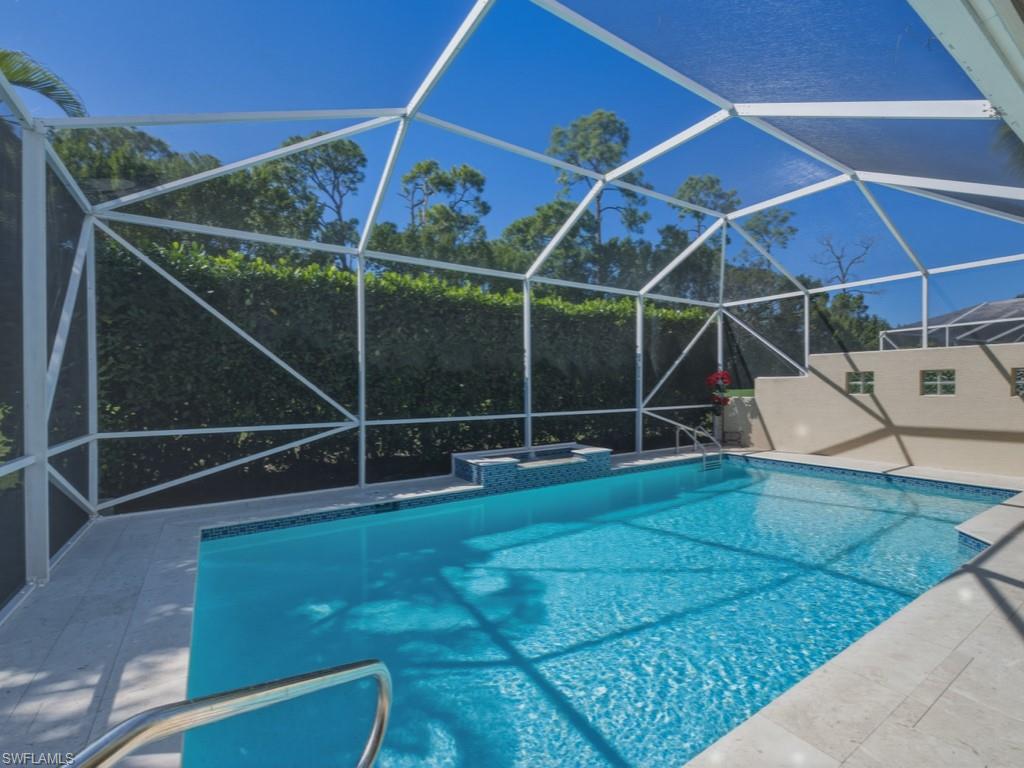 5835 Persimmon Way Naples, FL 34110 - Photo 20 of 50 a view of a backyard