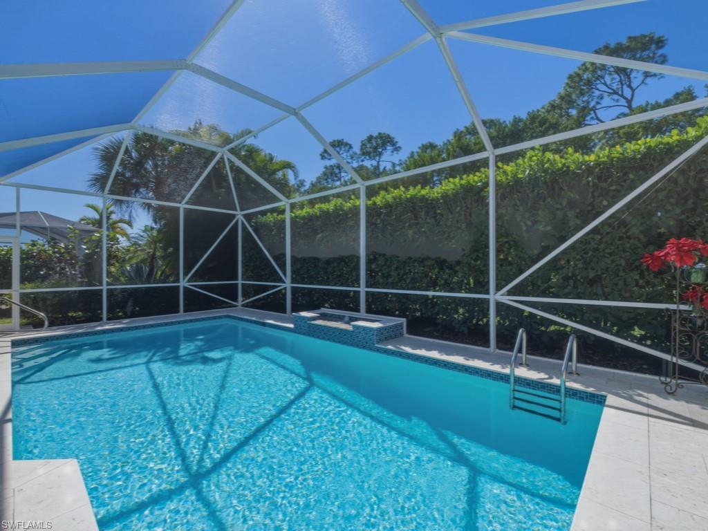 5835 Persimmon Way Naples, FL 34110 - Photo 22 of 50 a view of yard with trampoline