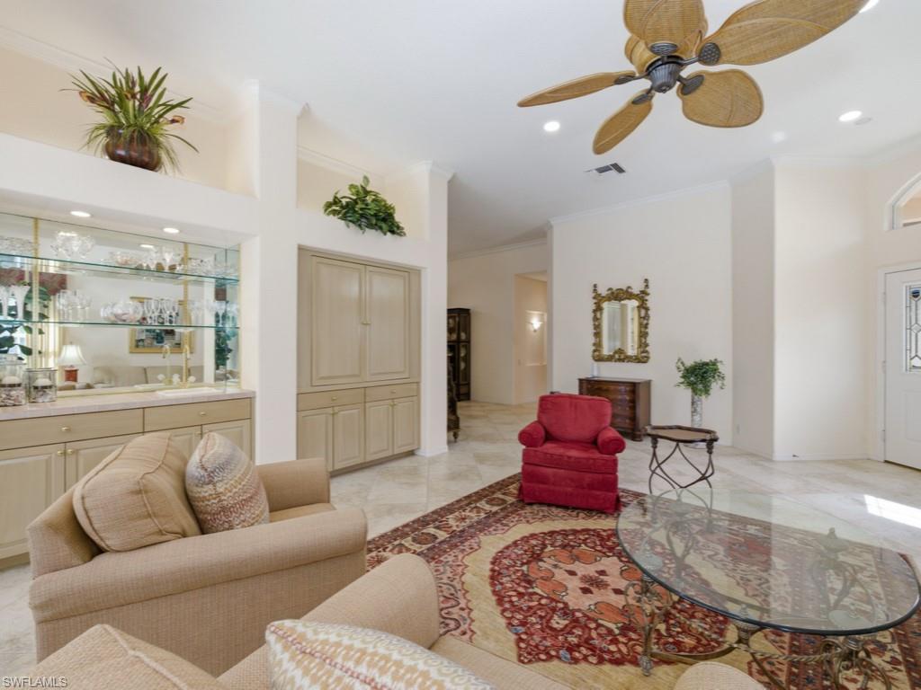 5835 Persimmon Way Naples, FL 34110 - Photo 8 of 50 a living room with furniture