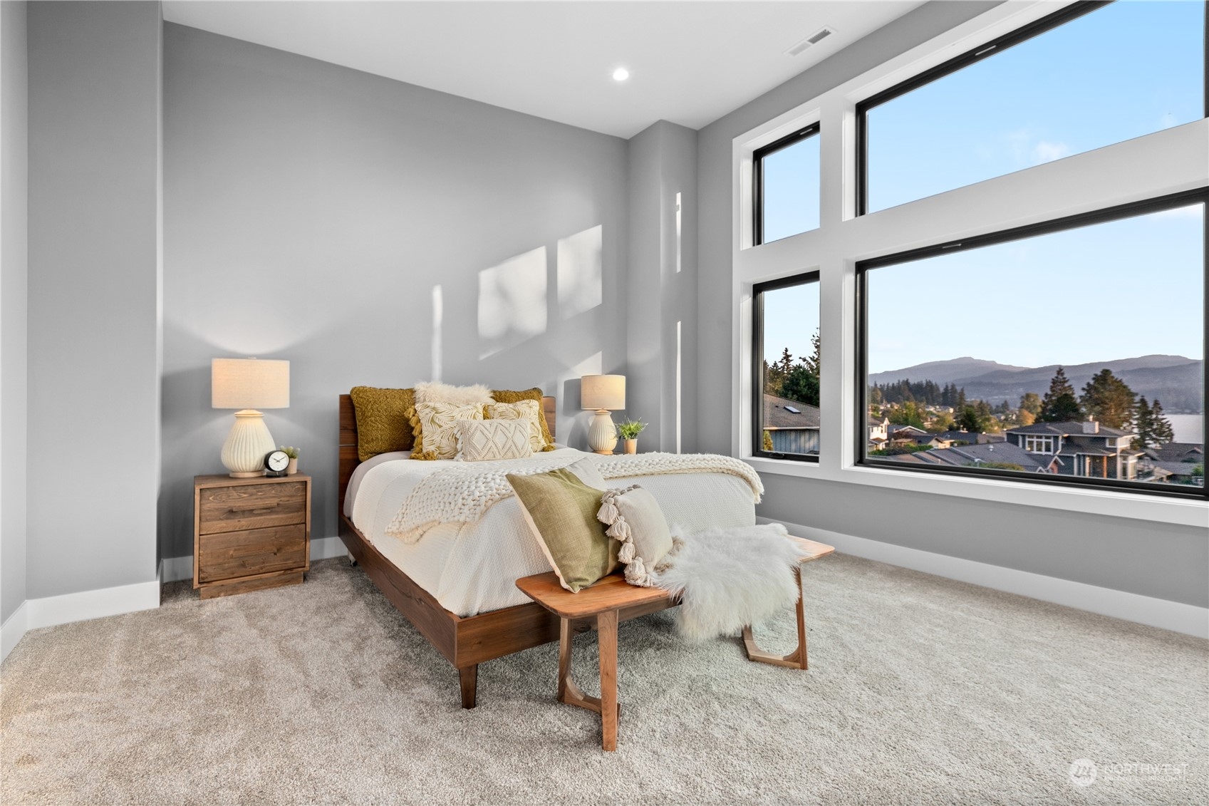 3015 Maynard Place Bellingham, WA 98226 - Photo 12 of 38 a bed sitting in a room next to a large window