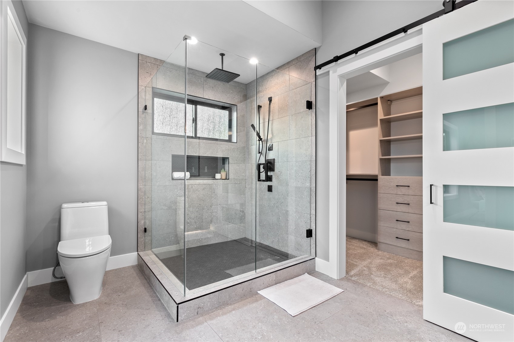 3015 Maynard Place Bellingham, WA 98226 - Photo 18 of 38 a bathroom with a shower and a toilet