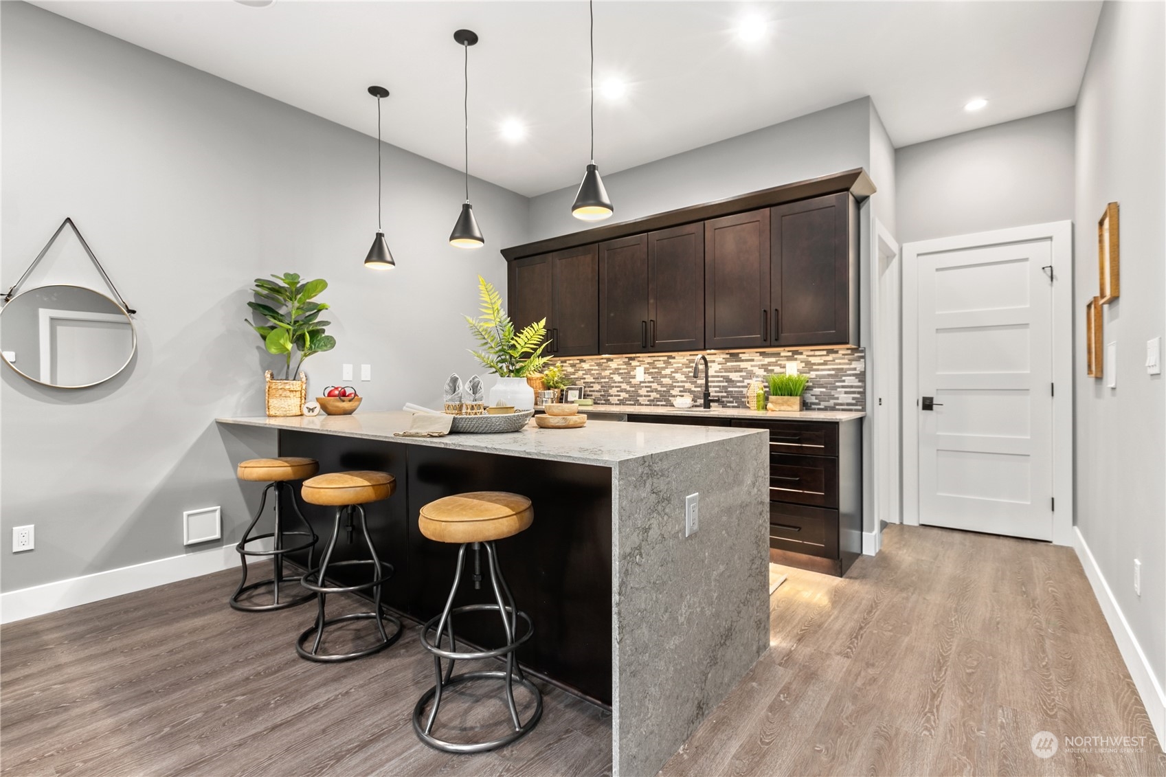 3015 Maynard Place Bellingham, WA 98226 - Photo 24 of 38 a kitchen with granite countertop a table and chairs in it
