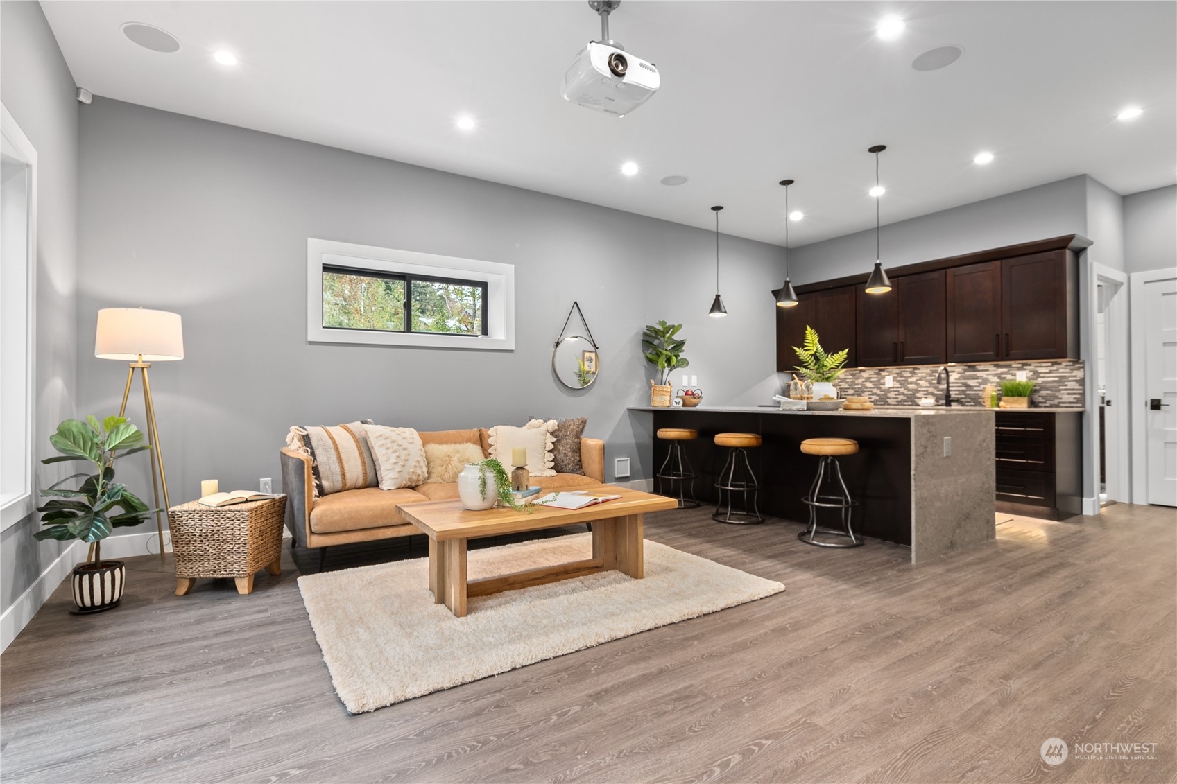3015 Maynard Place Bellingham, WA 98226 - Photo 27 of 38 a living room with furniture and a flat screen tv