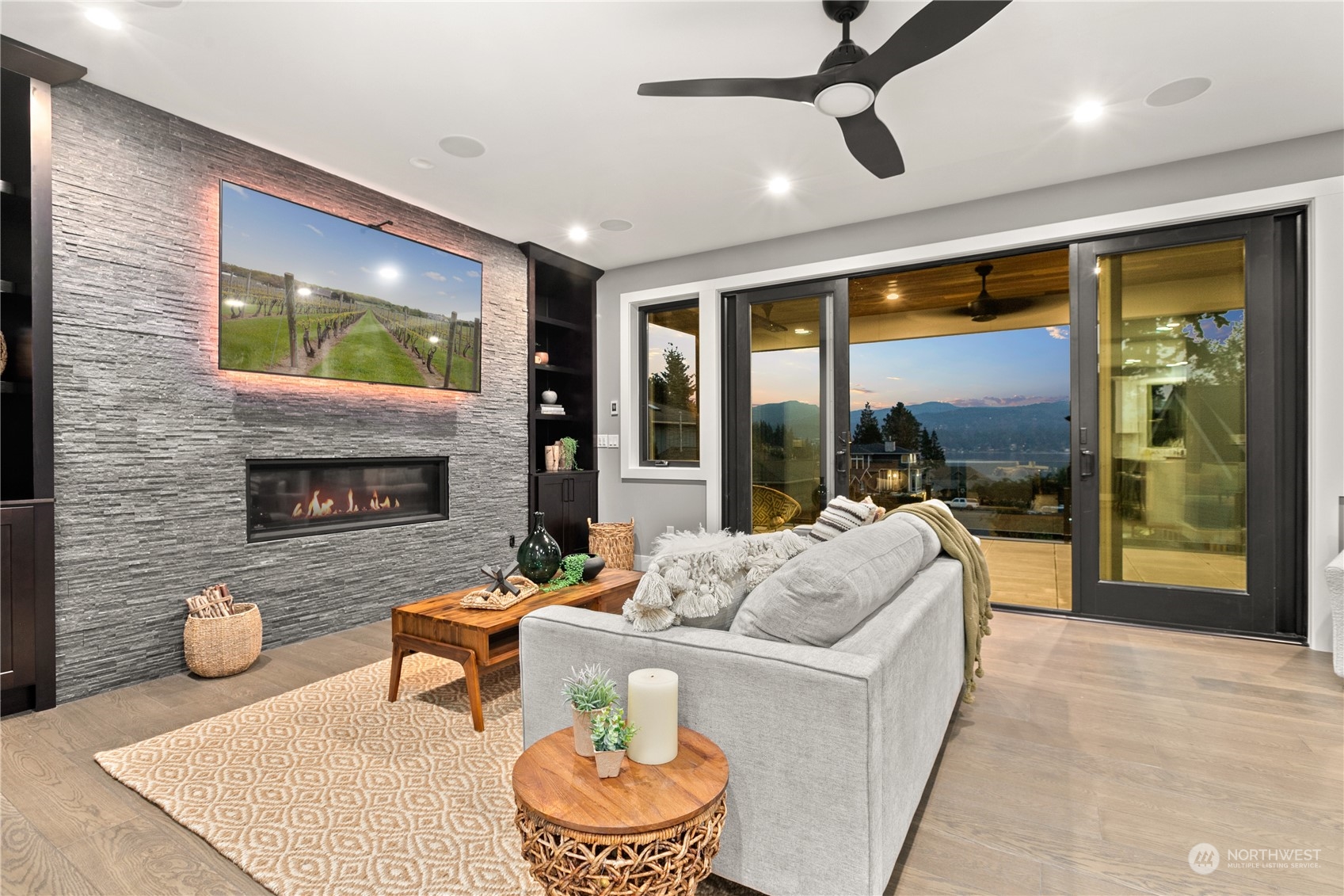 3015 Maynard Place Bellingham, WA 98226 - Photo 7 of 38 a living room with furniture and a fireplace