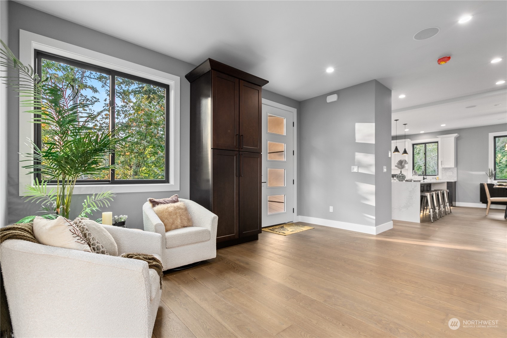 3015 Maynard Place Bellingham, WA 98226 - Photo 8 of 38 a living room with furniture and large windows