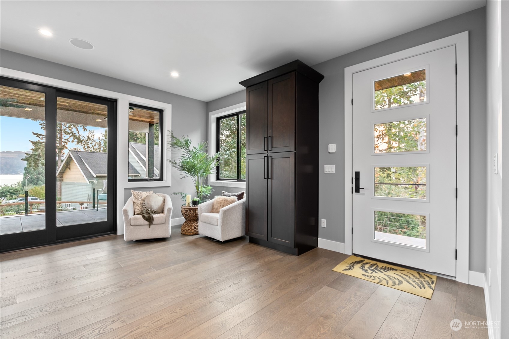 3015 Maynard Place Bellingham, WA 98226 - Photo 9 of 38 a living room with furniture and large windows