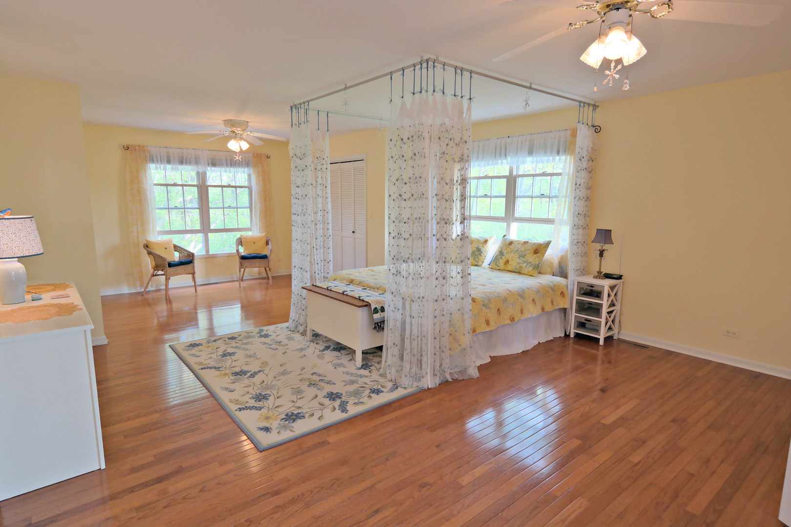 4115 Wilson Road Woodstock, IL 60098 - Photo 14 of 44 a living room with furniture and a chandelier