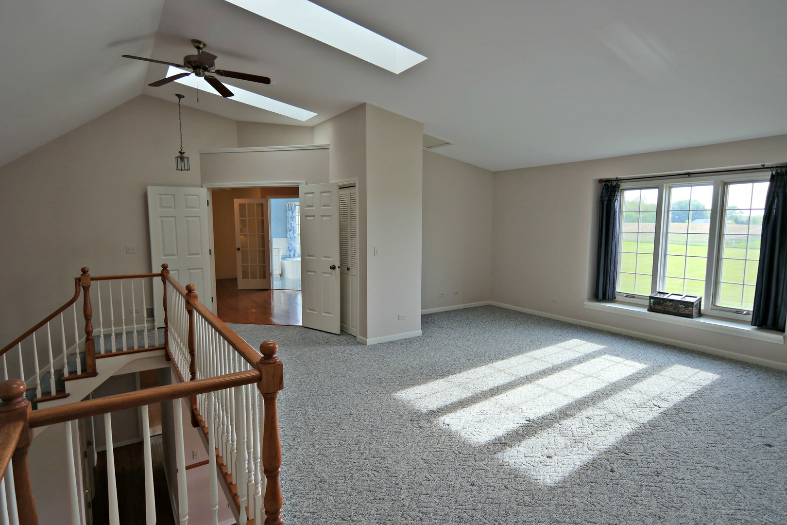 4115 Wilson Road Woodstock, IL 60098 - Photo 18 of 44 a view of entryway and hall with a window