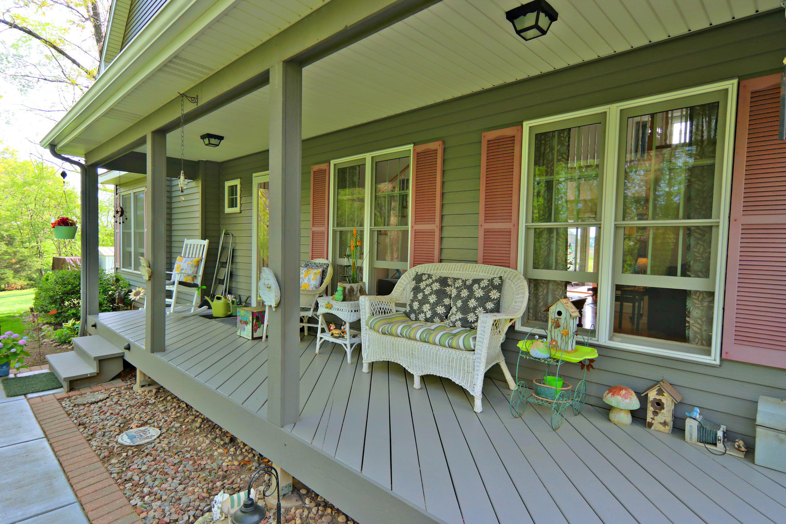 4115 Wilson Road Woodstock, IL 60098 - Photo 27 of 44 a balcony with furniture and wooden floor